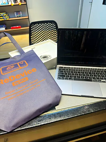 MacBook and ReDevice bag on the counter